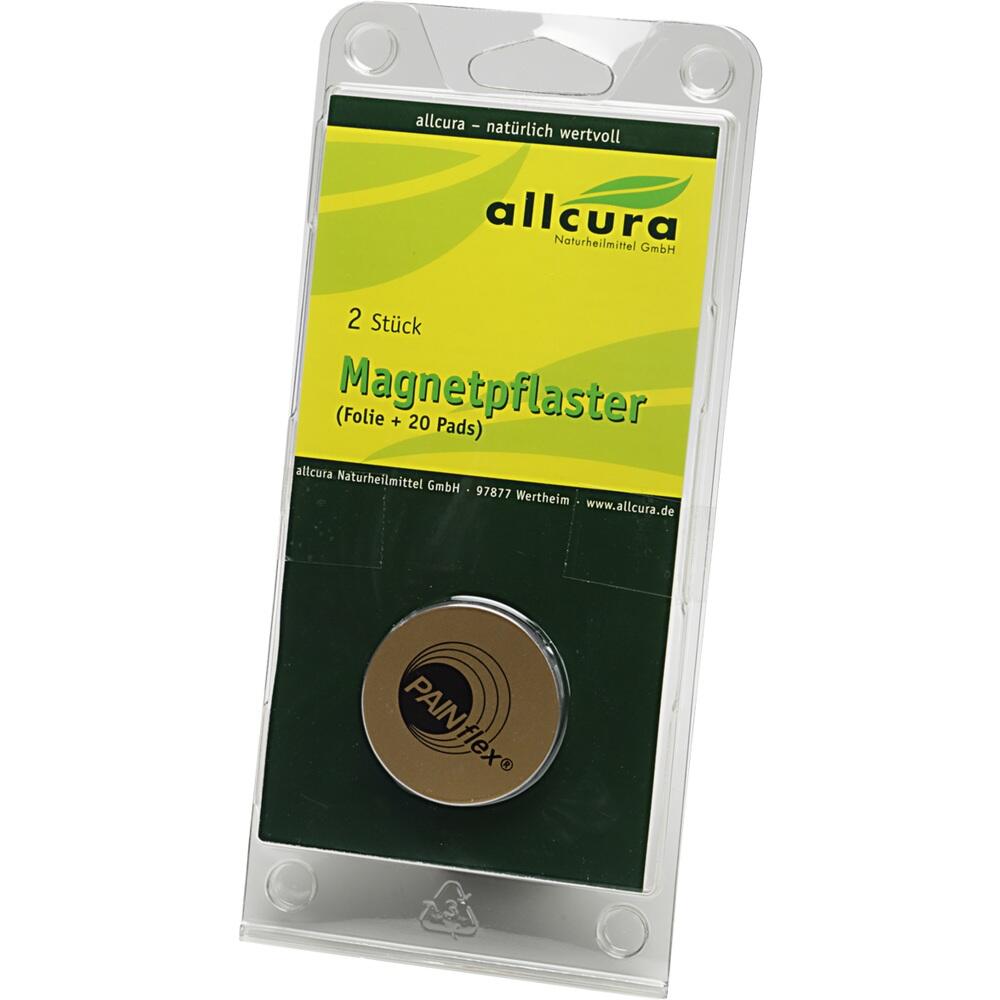 Verpackung mit Magnetpflastern der Marke Allcura und einem runden Magneten.